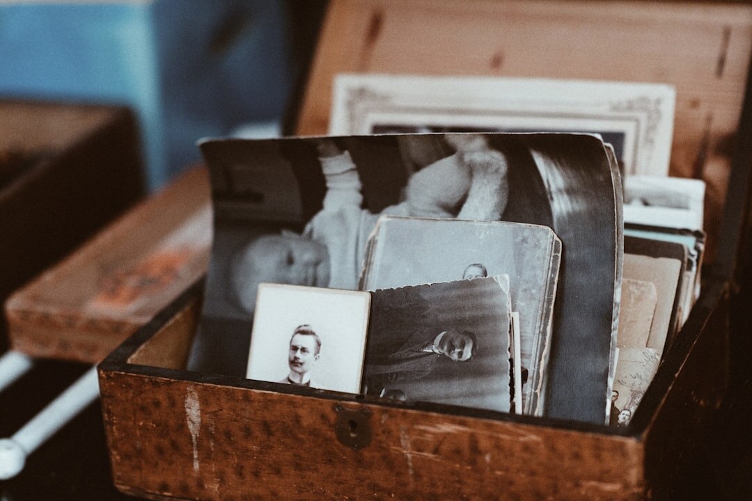 person sorting old photos